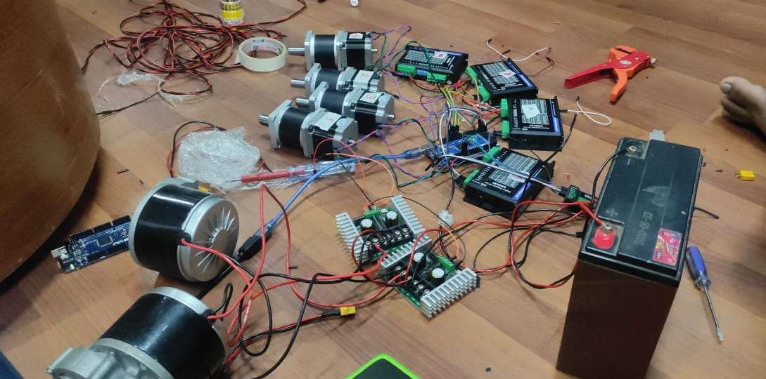 Me configuring and testing rover's steering steppers, feedback mechanism etc